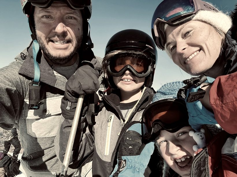 Charlie and her family on a ski day